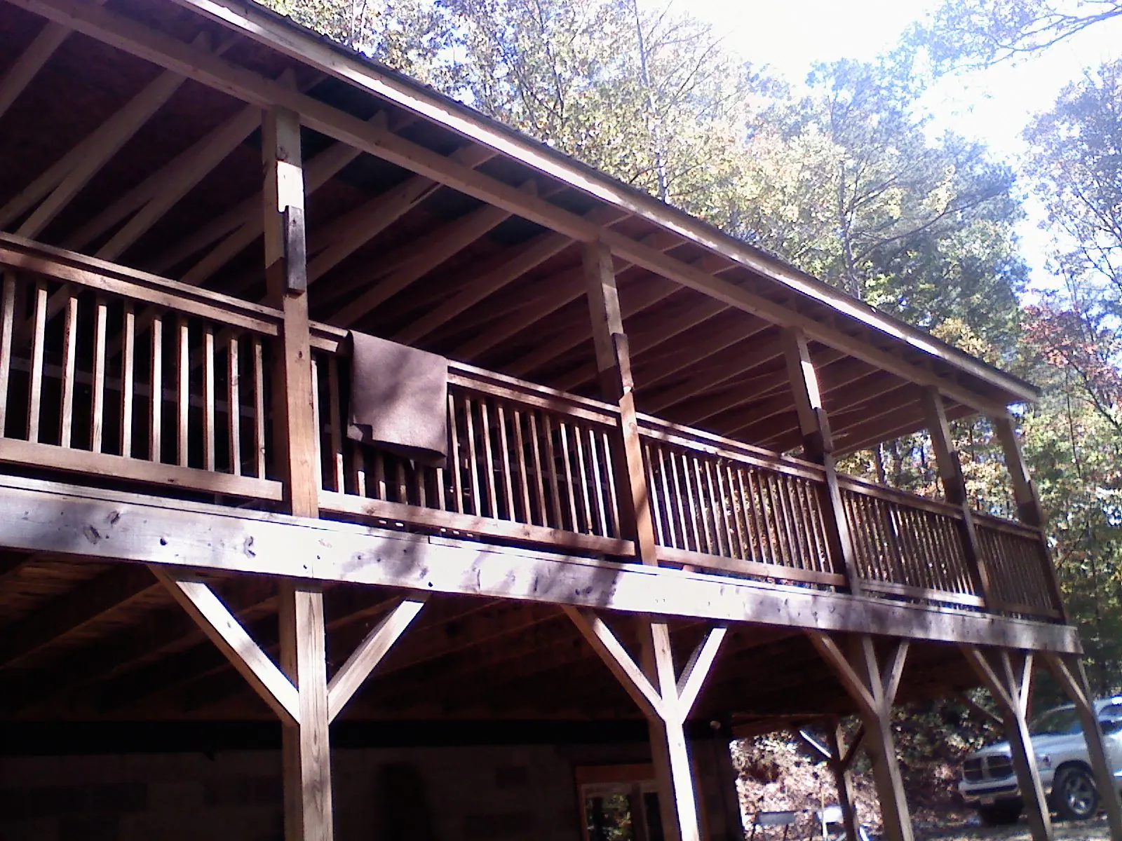 Timber framing under a new elevated porch and deck — Roof Leak Repair in Uhrichsville by Roofing Brothers